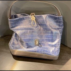 Vintage Dooney with registration card included.